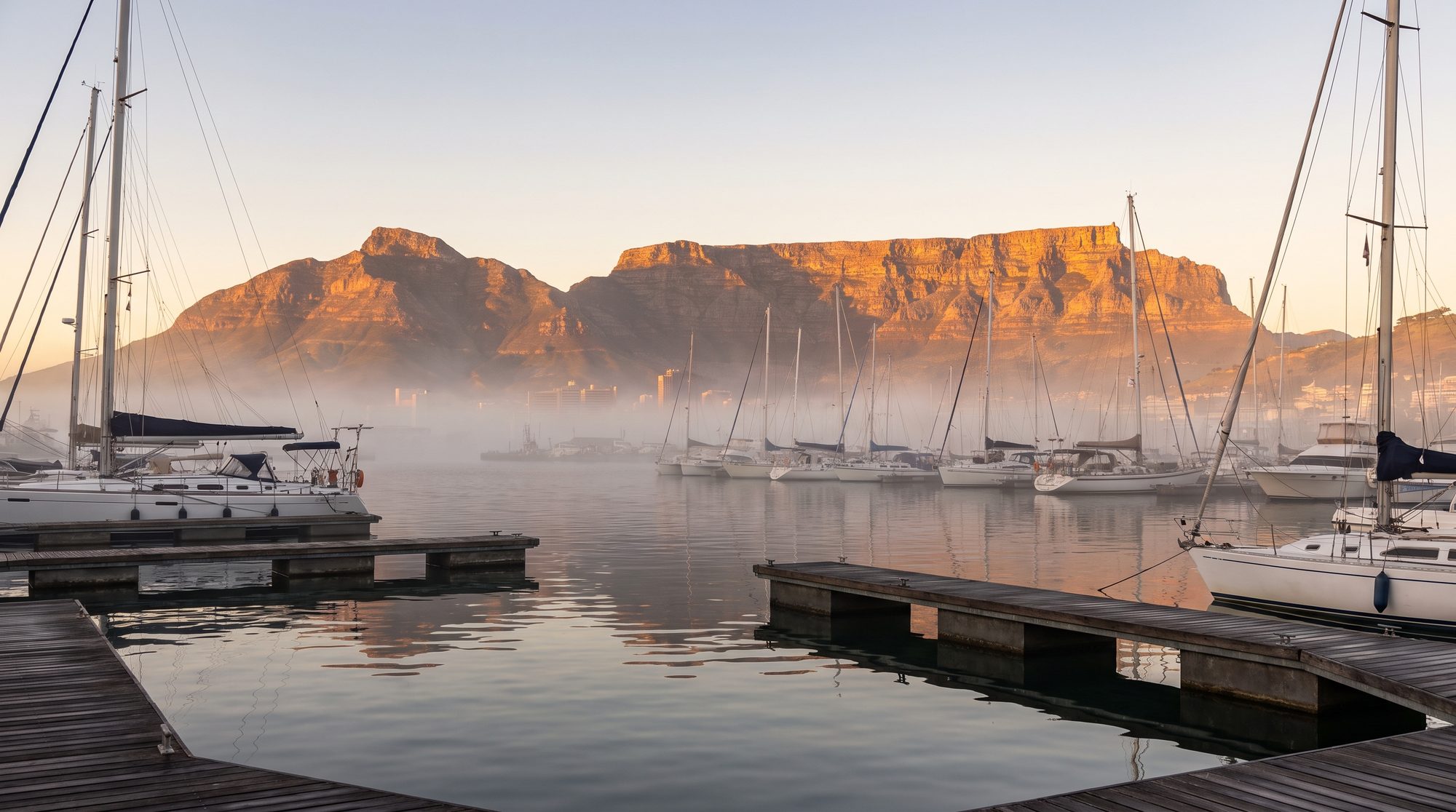 Table Mountain at dawn over the Waterfront marina
